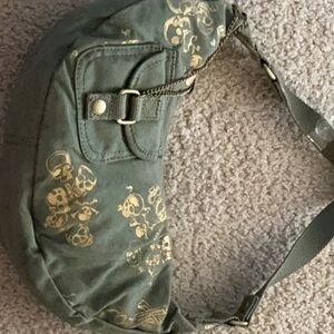 Army green with gold skulls small shoulder purse. NWOT